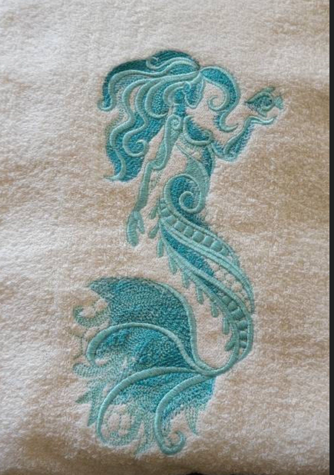 Embroidered Mermaid Hand Towel. Gorgeous Mermaid embroidered in beautiful ocean colors. Add a touch of coastal luxury to any bathroom.