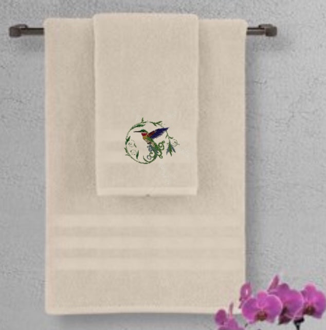 Hummingbird Embroidered Towel. Hummingbird in Flight with Long Swirled Tail Feathers